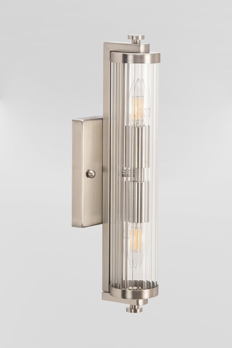 Art deco wall  light with clear glass and a steel brushed nickel finished bracket. 