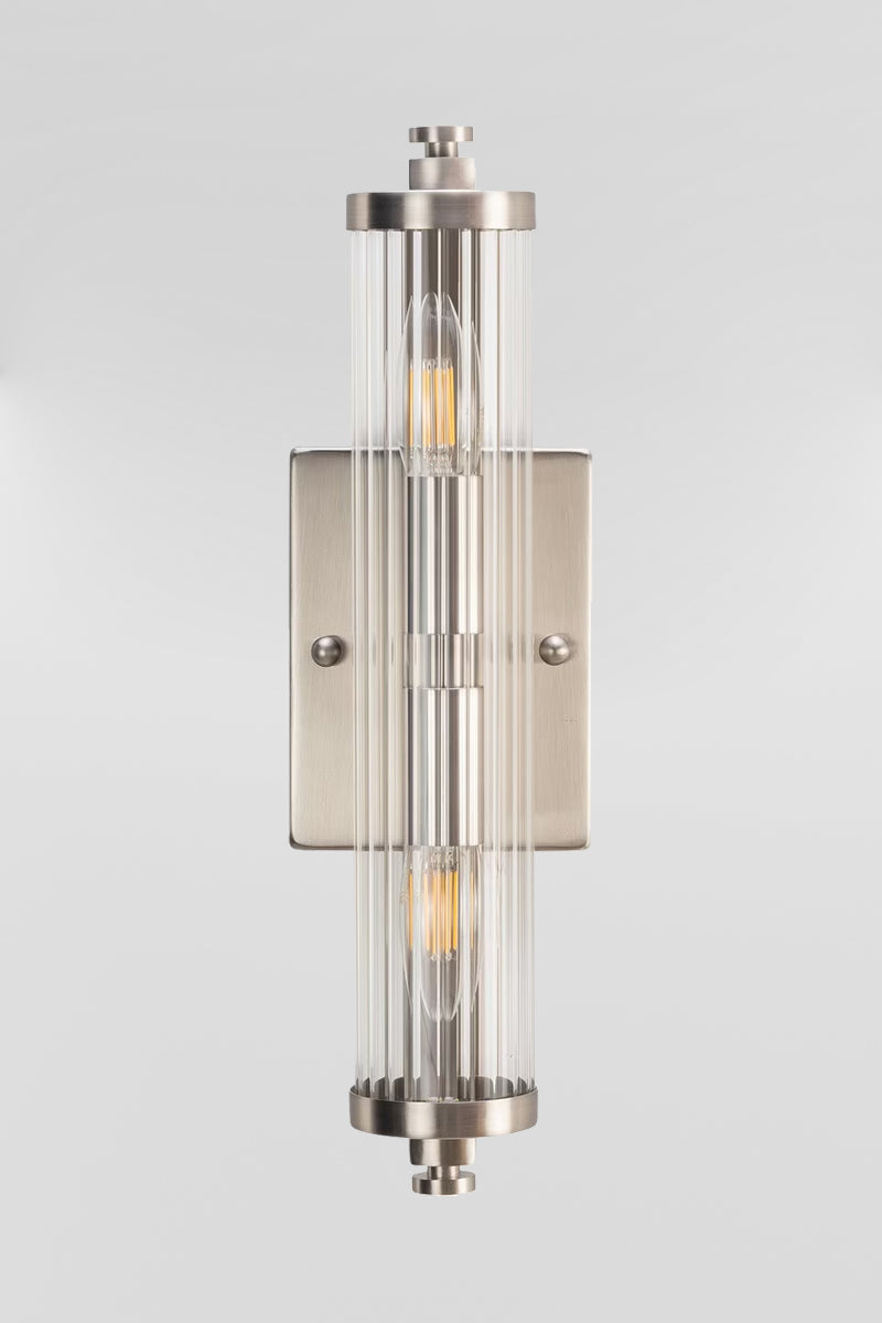 Front view of the Art deco wall  light with clear glass and a steel brushed nickel finished bracket. 