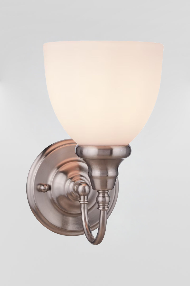 Illuminated brushed nickel wall light with gooseneck arm and open opal glass shade. 