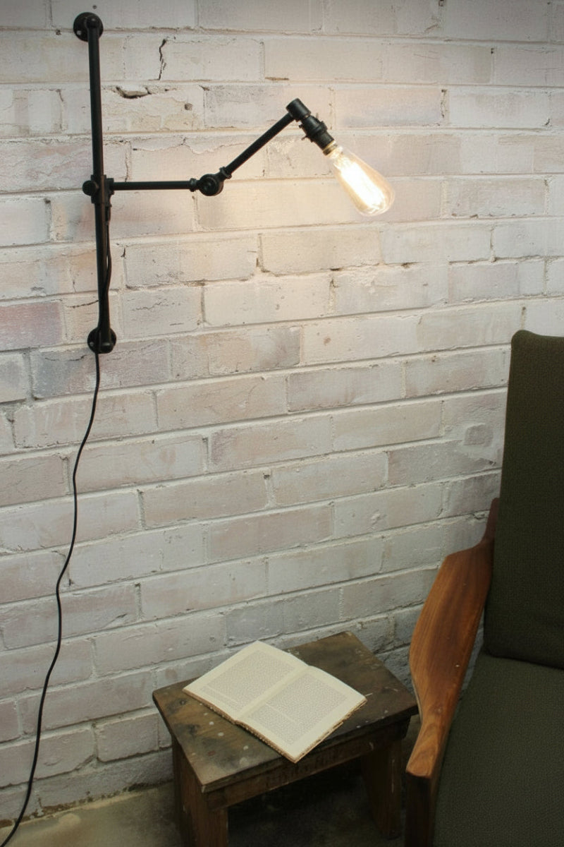 Swing arm wall light