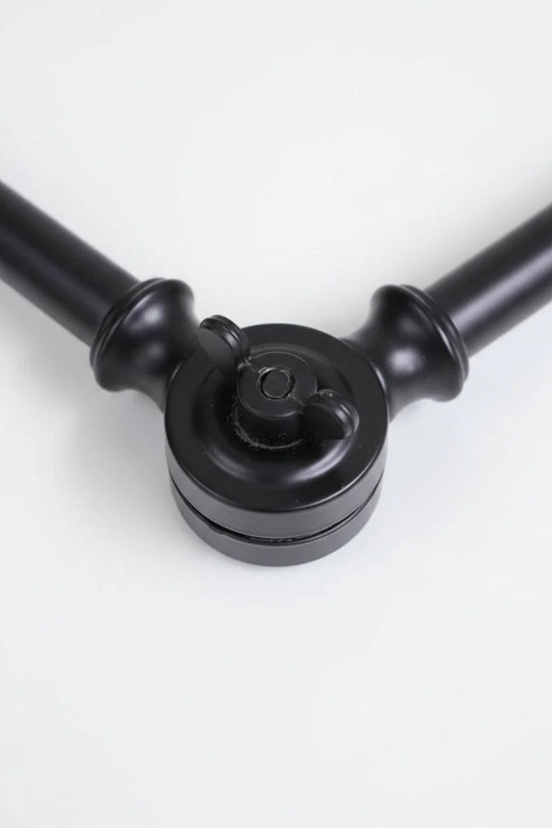 Swing arm wall light knuckle for fixing arm into place