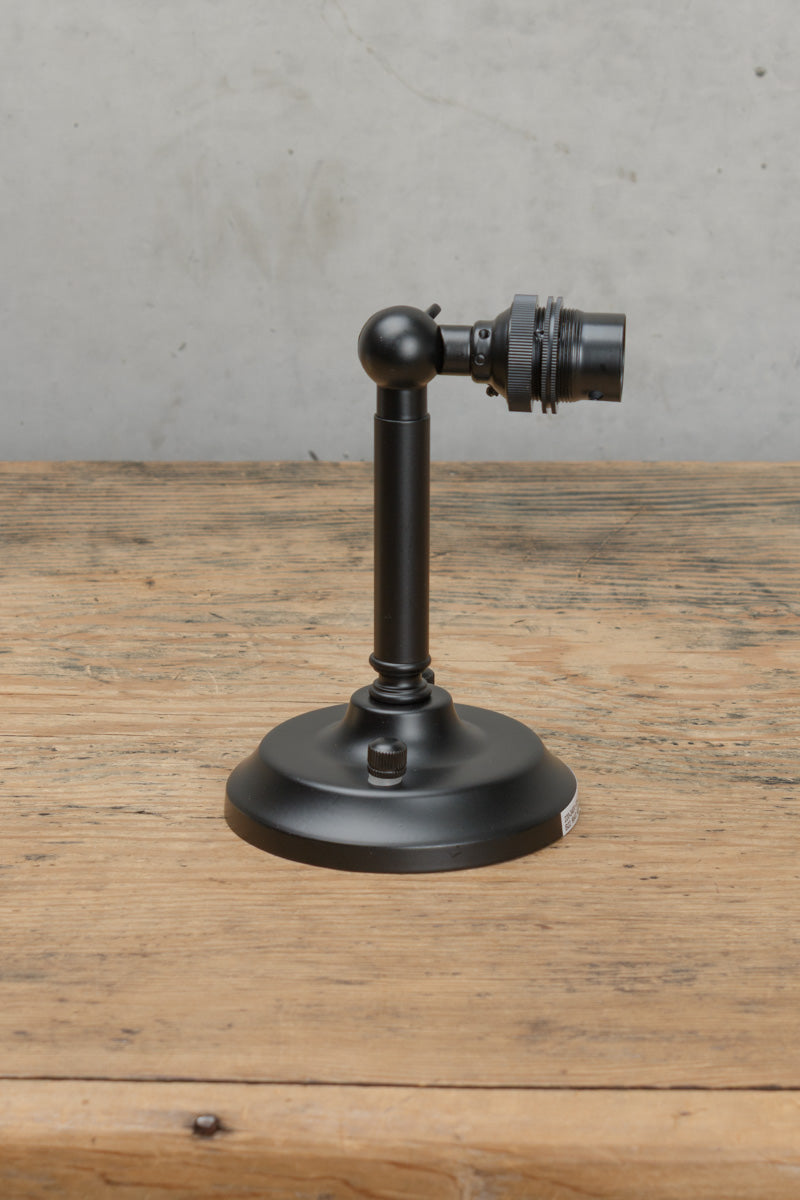 Short B22 wall arm in a black finish