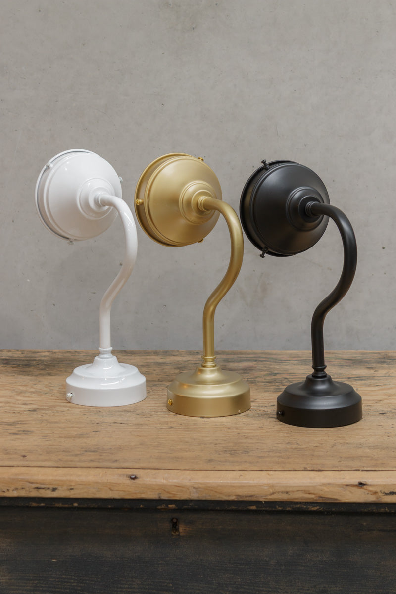 Exterior gooseneck wall arm with a 3 1/4inch Integrated gallery in three finishes.