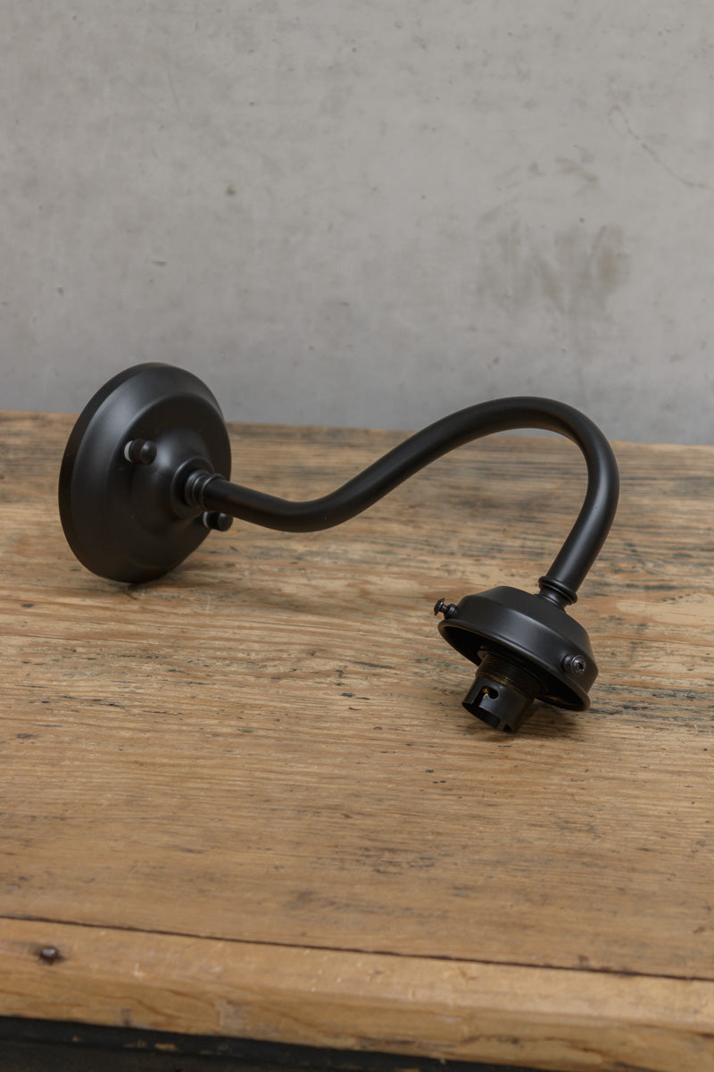 Black outdoor wall sconce with integrated 2 1/4 inch cup. 