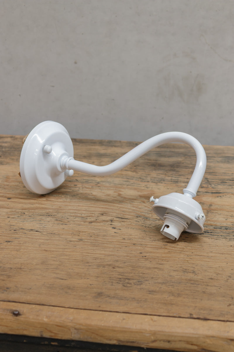 White outdoor wall sconce with integrated 2 1/4 inch cup. 