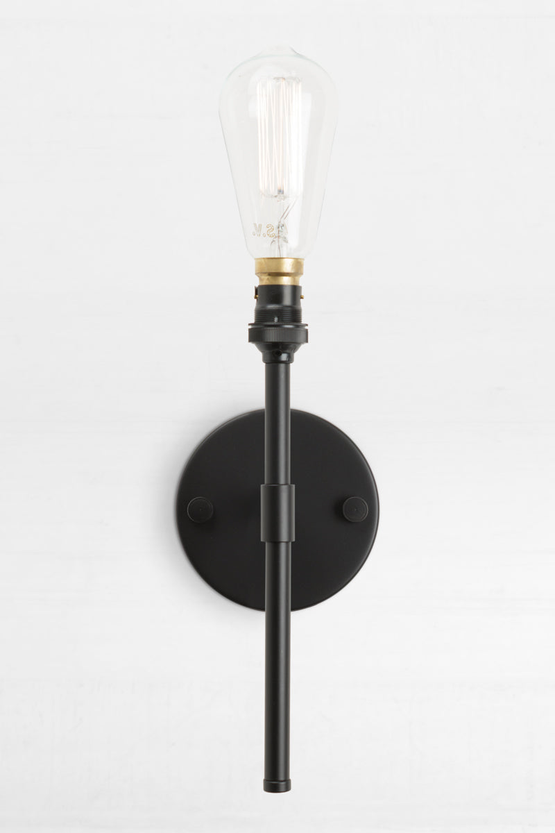 Stem wall light in black ideal for narrow wall placements