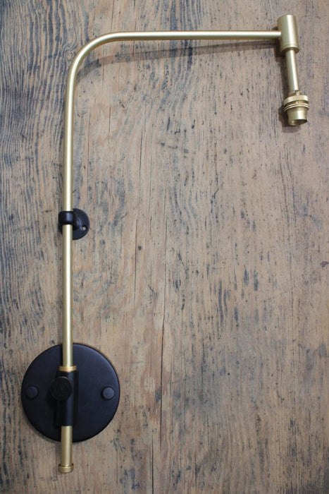 Wing Arm Light Fixture in brass gold