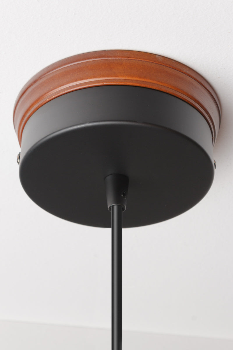 Natural finished mounting block and black ceiling rose. 