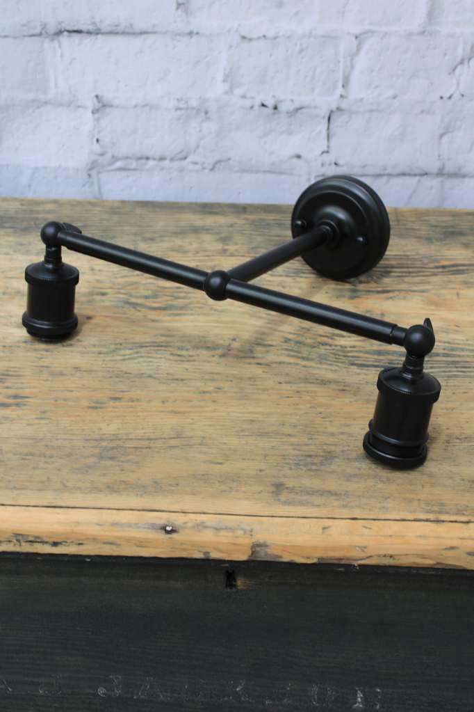 Black steel double swivel wall sconce. 