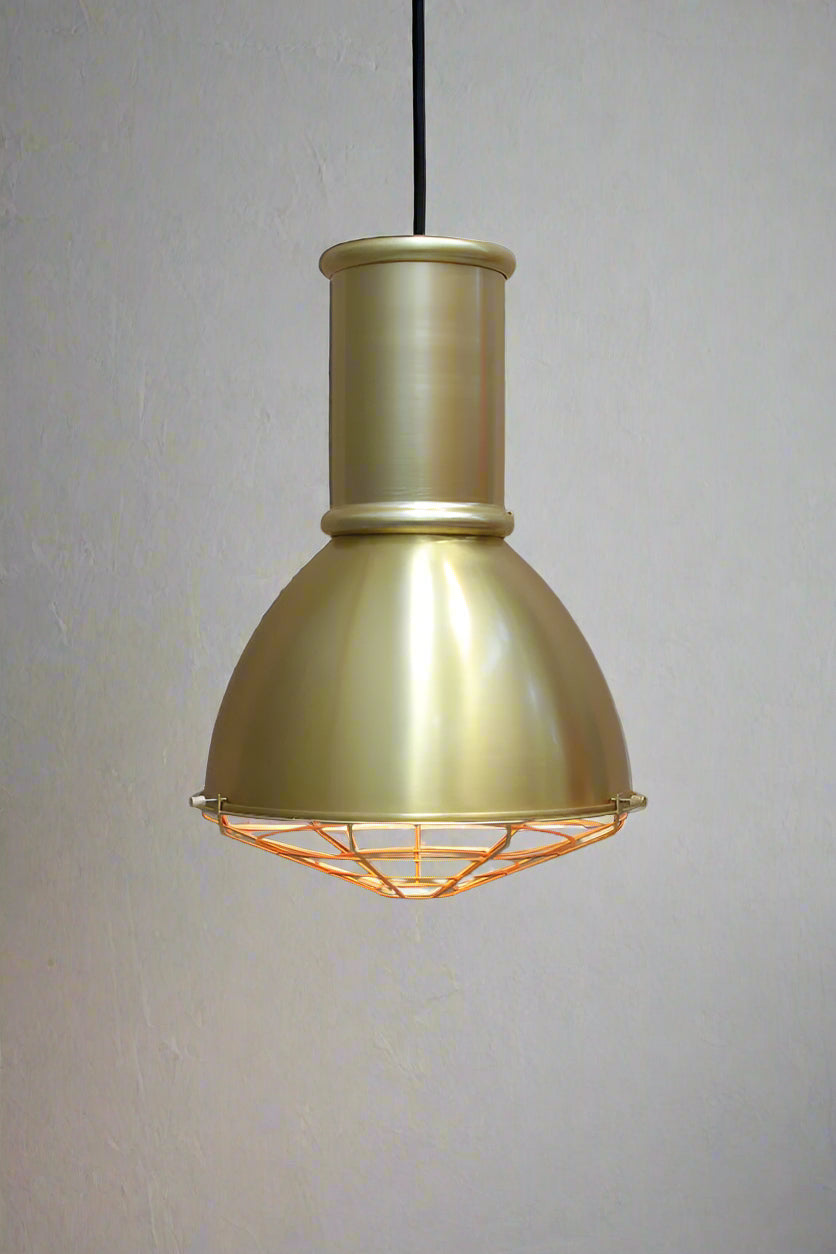 Gold/brass loft shade with tall gold shade cap and cage guard. 