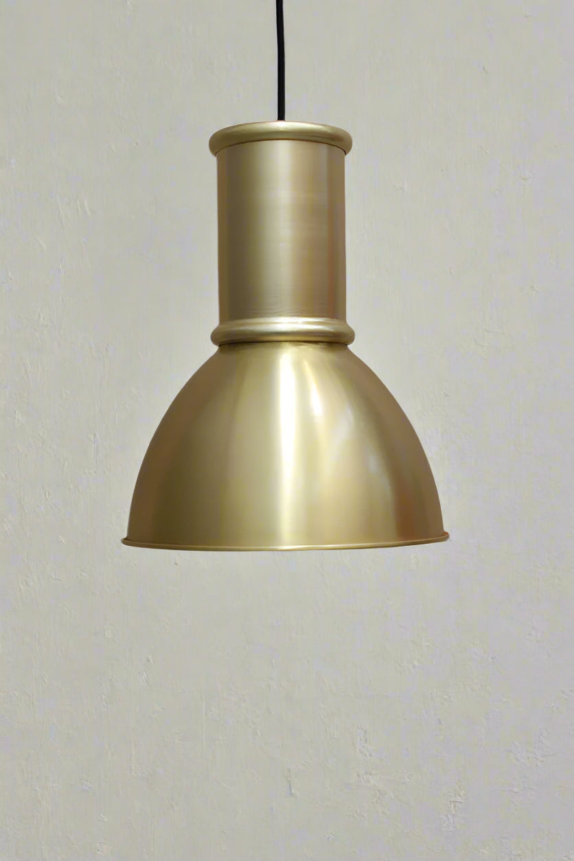 Gold/brass loft shade with tall gold shade cap. 