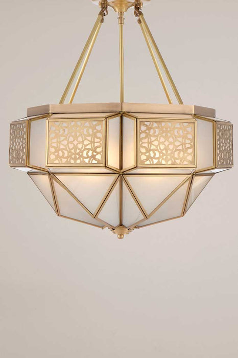brass pendant light with an intricate lattice pattern