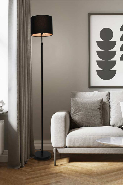 fabric floor lamp in black in a living room
