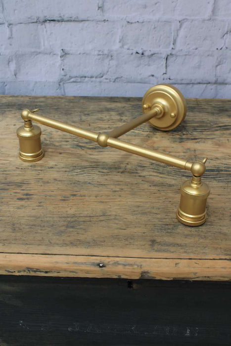 gold/brass steel double arm wall sconce