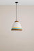 Brown paper pendant light hanging from ceiling.