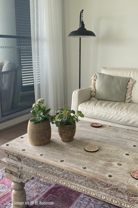 Black floor lamp in a customers living room. image via H. Robinson.