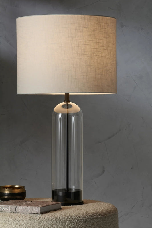 Glass table lamp with white shade. 