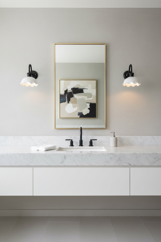 Ceramic shade in glossy whit on a mat blace wall sconce in a black and white bathroom. 