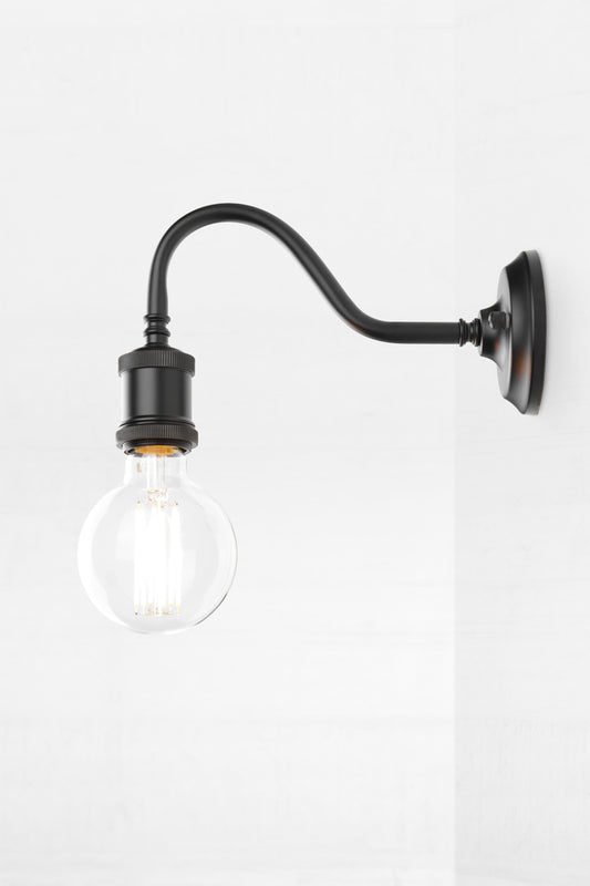 Side view of the small outdoor gooseneck wall sconce in black. 