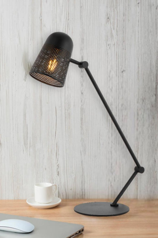 Table Lamp standing on a table, adding stylish illumination to the space.