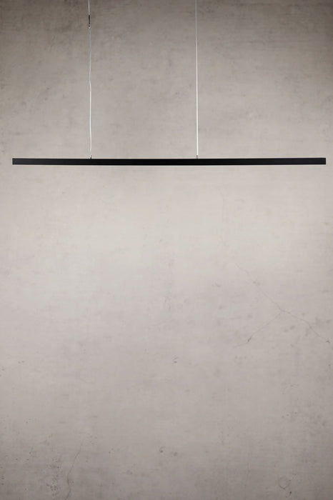 Black linear pendant light with stainless steel cables