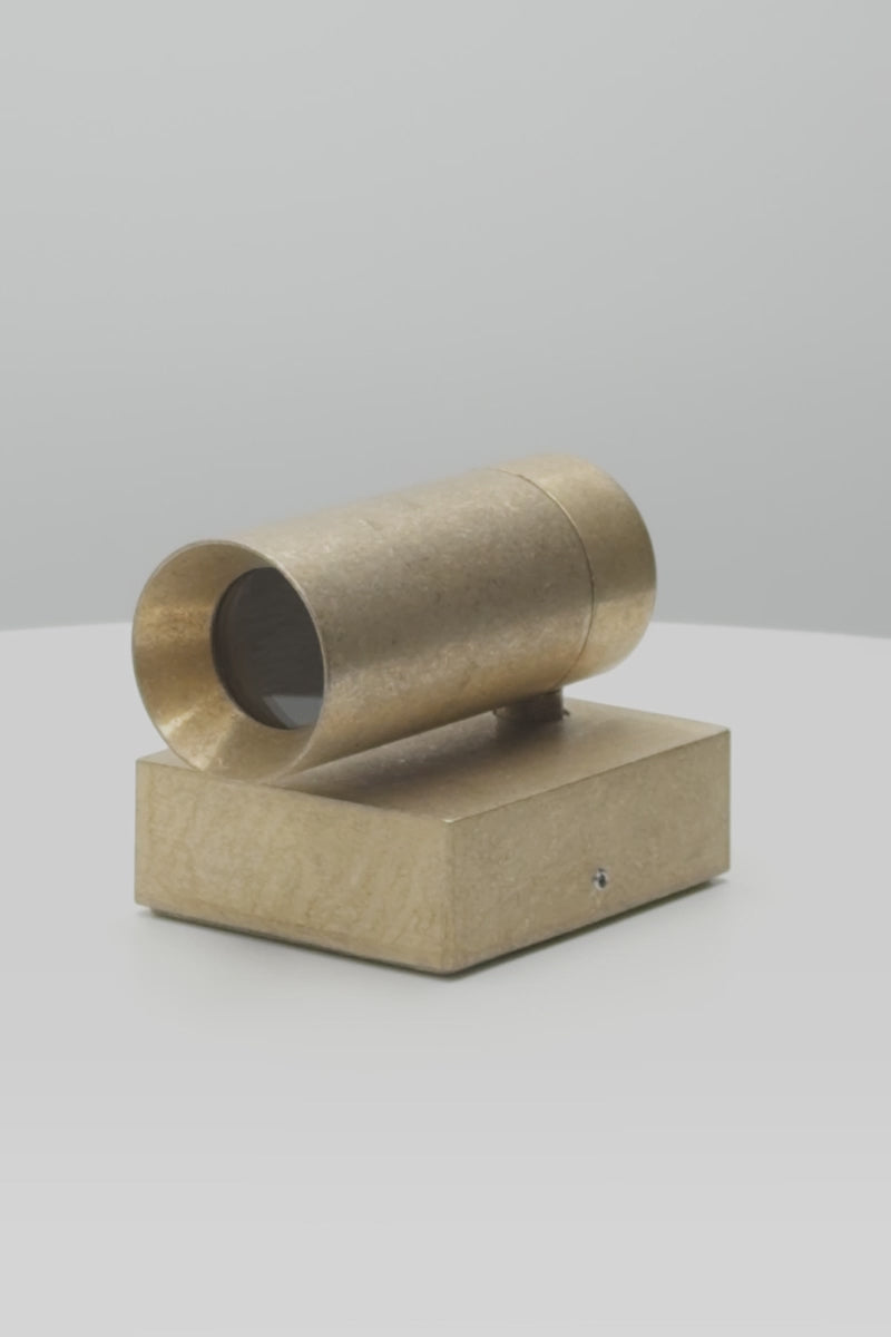Video showcasing the antique brass adjustable wall spotlight from multiple angles, highlighting the brushed finish, directional spotlight head and compact wall mounted design.