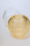 Video of clear and amber reeded glass ball shade finishes. 