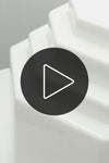 Video showcasing the Daphne opal glass shade on a turn table in a white space. 