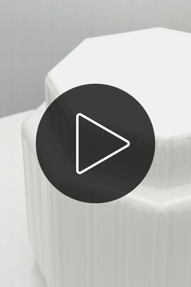 Video showcasing the opal glass Harcout shade on a turntable in a white space.