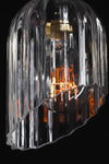 Video of the clear glass elongated shade with fluted detailing and featuring an angled cut design. 