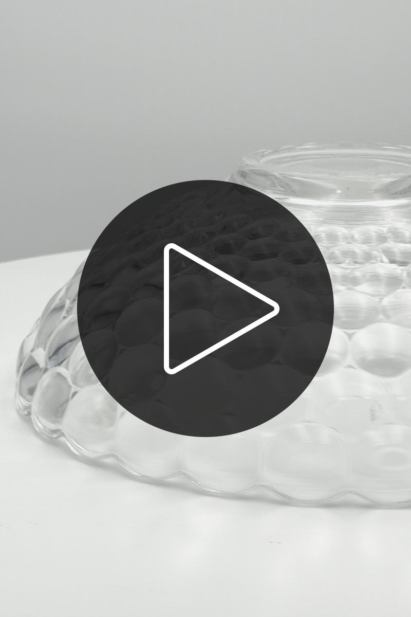 Video showcasing the clear glass Belrose shade with bubbled detailing on a turn table. 