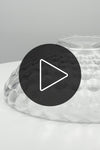 Video showcasing the clear glass Belrose shade with bubbled detailing on a turn table. 