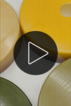All four Gambier glass shades feature on a white turntable. 