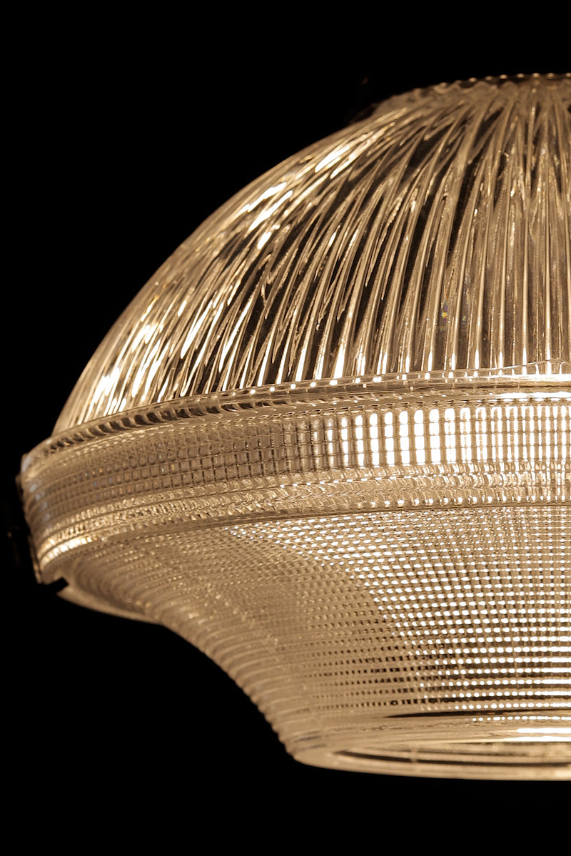 Video showcasing the vintage inspired optical glass shade with rippled and Holophane detailing and black industrial features.