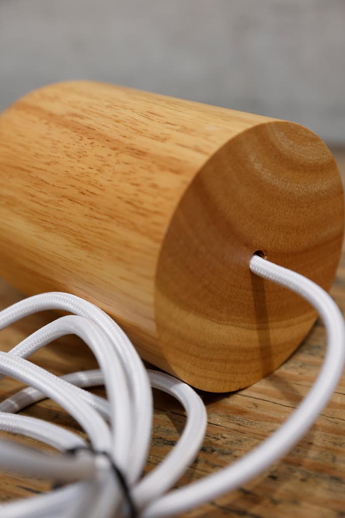 pendant cord with fitting made out of natural wood, timber.