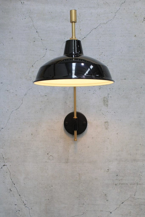 warehouse shade black with gold arm sconce