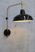 black small warehouse shade with gold arm sconce