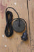 black cloth suspension cord and ceiling rose