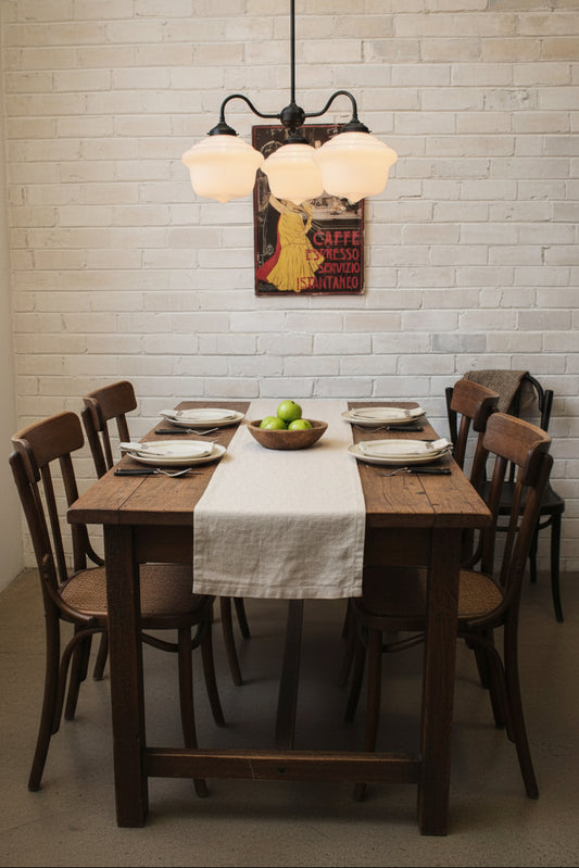 3 light schoolhouse chandelier over wooden table