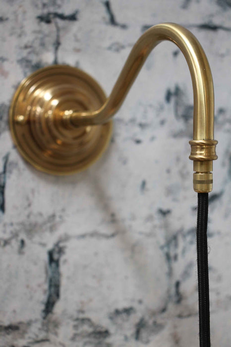 gold-gooseneck-wall-sconce-with-black-cord