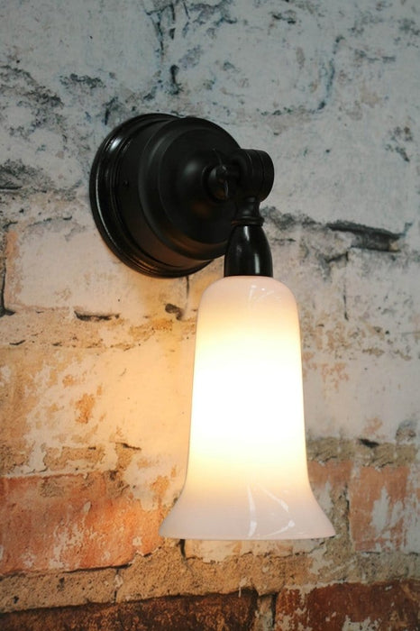 Adjustable opal glass wall light