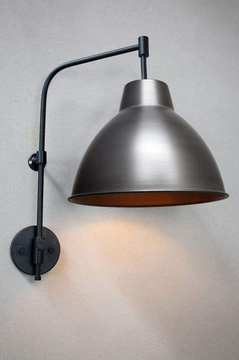 Adjustable steel wall light