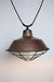 Aged copper pendant light with cage guard