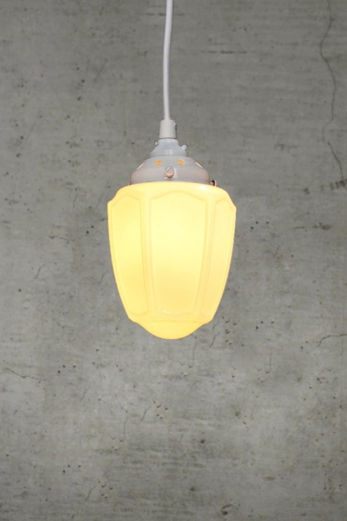 Pendant with white cord