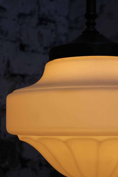 Auberge gooseneck wall light soft curves and sophisticated milk glass shades