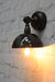 Bakelite wall light with black bowl shade