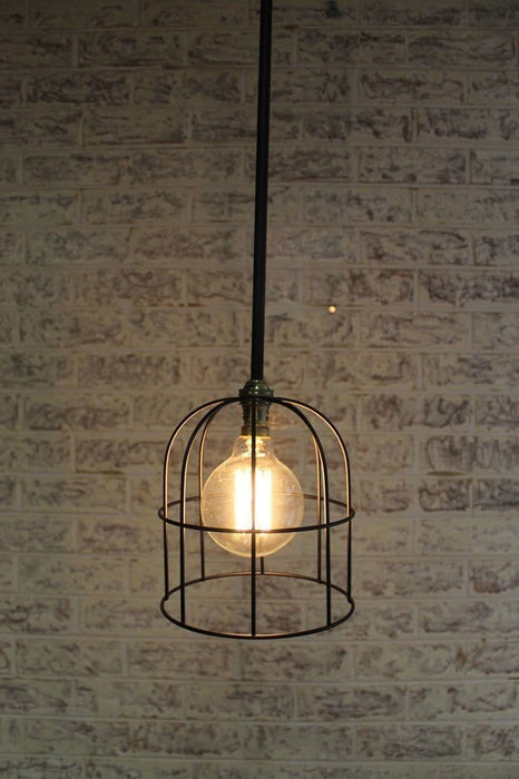 Bare pole with large cage shade and large edison bulb