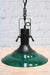 Tiltable pendant light with green painted shade