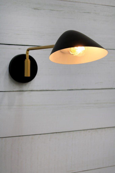 Black and brass adjustable steel wall light