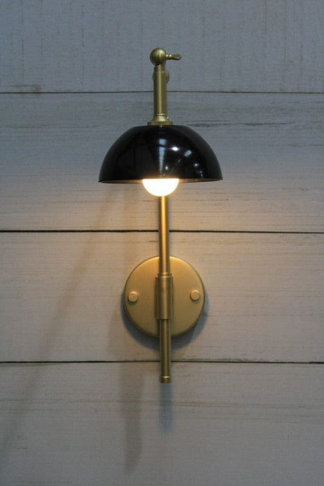 Gold/brass sconce with black shade